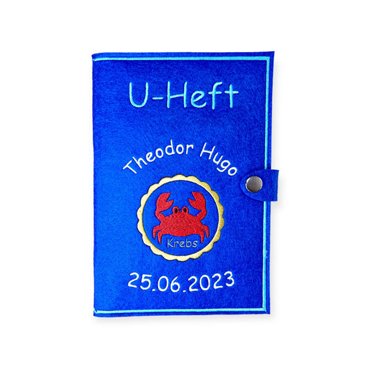 U-Heft-Hülle personalisiert, bestickt mit Sternzeichen, Name und Geburtsdatum