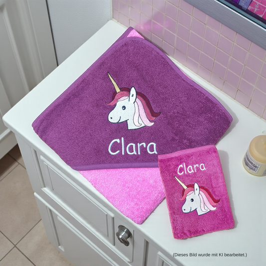 Geschenkset Kapuzenhandtuch 100x100 cm und Waschlappen, Set in pink/mauve mit Name und Einhorn-Motiv, Geschenk zur Geburt